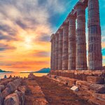 Sunset over the Poseidon Temple ruins at Cape Sounio