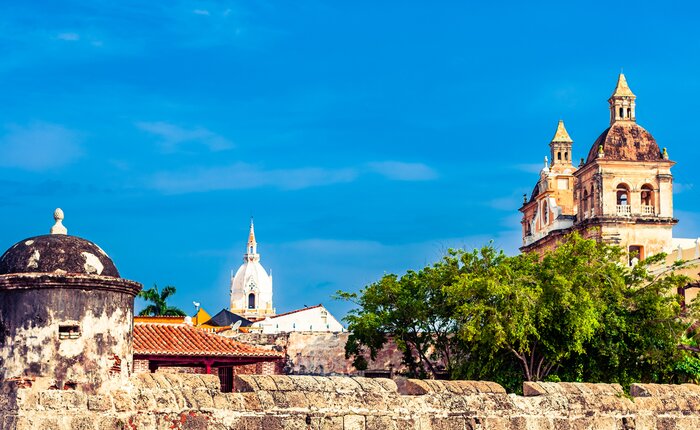 Explore Cartegena's colorful Old Town and preserved fortress on foot