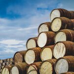Stacked whisky barrels in Speyside