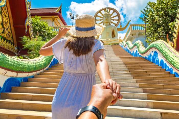 Take in the sights of Ko Samui, like the Big Buddha, with your partner