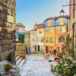 Explore the colorful houses of Largo da Pena Ventosa in Porto