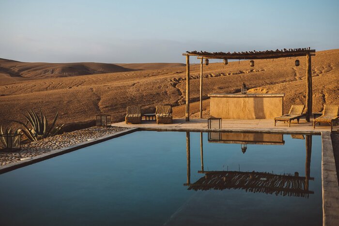 Experience the remote beauty of the Agafay Desert from a luxury camp