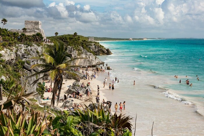 Take a dip in the Caribbean Sea after exploring the Tulum Archaeological Zone