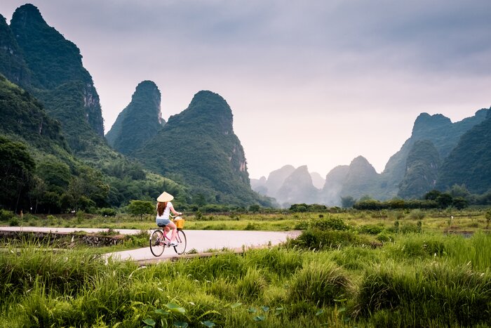 Cycle through Yangshuo's picturesque countryside, enjoying views of the karst mountains