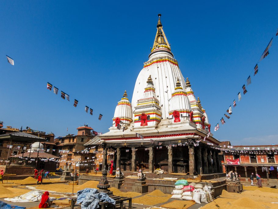 Villagers drying rice next to Machhindranath Temple in Bungamati