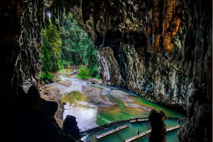 Take a bamboo raft through Lod Cave, Thailand