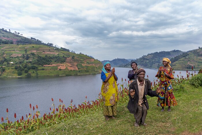 Batwa tribespeople dance and sing at Lake Bunyonyi in August