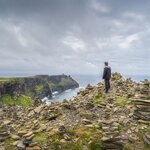 Stand at the edge of the famous Cliffs of Moher for those impressive snapshots