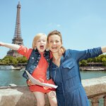 Snap a fun photo with views of the Eiffel Tower from the Seine