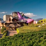 Spend two nights at Hotel Marqués de Riscal, the Gehry-designed property in northern Spain's La Rioja region