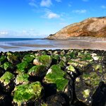 Discover the west shore of Llandudno's Conwy Estuary as you look toward Snowdonia National Park
