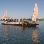 Set off on a four-day Nile River cruise aboard a luxurious dahabiya