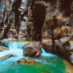 Follow your guide down the Siq Trail in the Mujib Nature Reserve