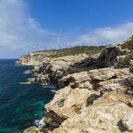 The rocky terrain leading up to the lighthouse