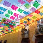 Colorful paper flags over a street in San Miguel de Allende