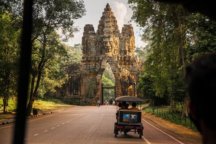 Tuk tuk riding toward Angkor Thom, Cambodia