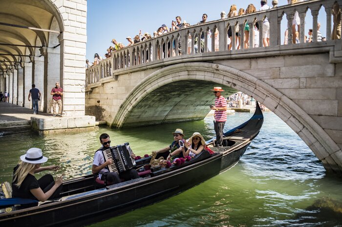 Delight in Venetian sights and sounds with a musician aboard your gondola