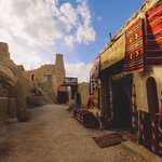 Take a trip out to the Siwa Oasis to explore ancient mudbrick fortresses and desert pools