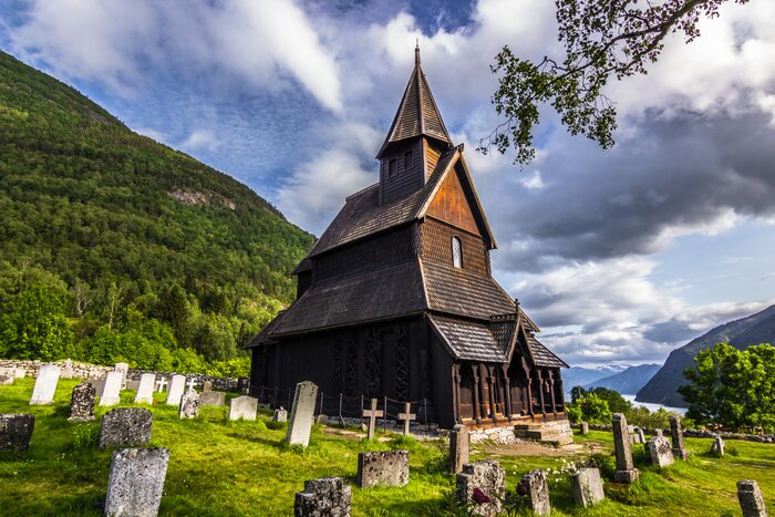 Admire one of 28 remaining stave churches in Norway, like the Urnes Stave Church on a western Norway summer road trip