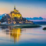 The enchanting Mont-Saint-Michel seems to rise out of its tidal estuary