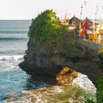 Start your journey across Bali at the iconic Tanah Lot Temple