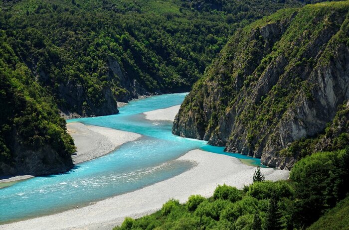 Travel through the Waimakariri Gorge on the scenic TranzAlpine Train
