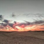 Watch the sunset from a Bedouin camp near Siwa