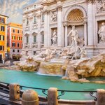 Walk to the Trevi Fountain in Rome and throw a coin in for good luck