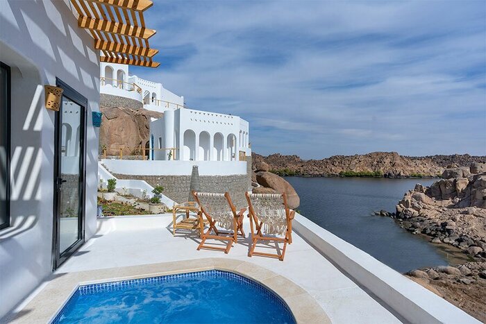 Kick back and admire Aswan views from your private terrace on an ultimate luxury itinerary (photo courtesy of BenBen Hotel)