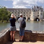 A couple look out at one of the Loire Valley's beautiful chateauxs