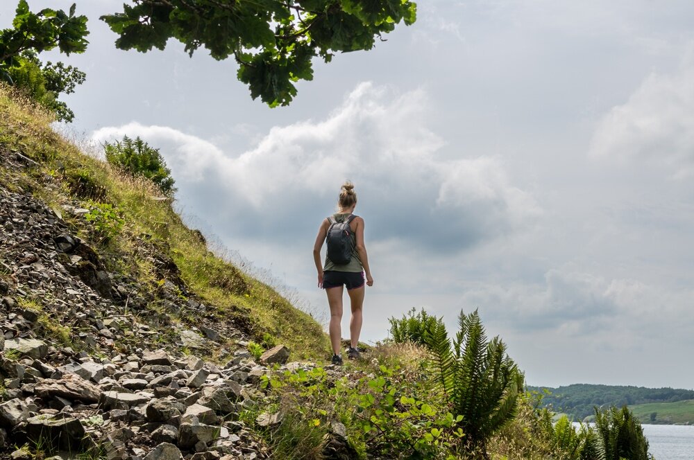 Young woman hiking in the Lake District, E