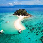 Visit Coron, Palawan for the stunning beaches, shallow reefs, and stellar diving
