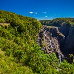 Board the Kuranda scenic railway for views of Barron Falls and the rainforest in Australia's Queensland