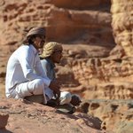 Our Bedouin guides for the 4x4 tour were Faris and Nasir. While they were quite knowledgeable, they claimed that they could not read or write or do mathematics. But, when it came to the gratuity, Faris suddenly discovered how to count money!  - Wadi Rum, Jordan. | Photo taken by Rich W
