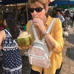 Enjoying my first fresh coconut | Photo taken by Deborah B