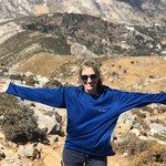 As we circled around the mountain, the winds picked up and we battled the force of the winds to the summit, hoping for a clear view. | Photo taken by Kris M