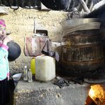 Our guide 'testing' for us the "Happy Water" We are quite happy so we bought a bottle home! | Photo taken by Su-Lin T
