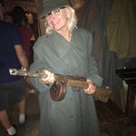 Military coats, hats, & guns for trying on | Photo taken by Barbara D