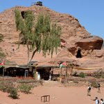 There was a café across from the Monastery. In addition to enjoying a refreshing (and expensive) beverage, there were two interesting things of note that occurred.  One, we met an American archaeologist who was leading part of the digs that you can see in the distance at the top of the rock and to the far right.  Two, we met a deaf guy from Ireland who was seated next to us at the café. He was surprised and delighted that Rich signed, and they enjoyed a wonderful conversation, discovering a few differences in signs used in Ireland versus those used in the United States. | Photo taken by Rich W