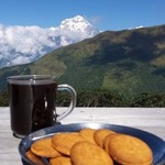 Morning coffee break in front of Dhaulagiri, the world's 7th highest peak. | Photo taken by William N