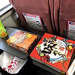 Bento boxes in the train | Photo taken by Joost S