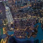 It was fascinating to watch the lights come on in the nearby buildings as dusk began.   - Burj Khalifa, Dubai, United Arab Emirates | Photo taken by Rich W