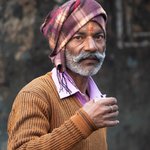 This Sikh man is staying warm in the chill air of Delhi. | Photo taken by Jean M