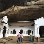Cave temple, Danbulla. 157 statues in this cave monastery. History begins 1st century BC when King Valagambahu took refuge here. 150 metres above the surrounding area. | Photo taken by Sylvanna C