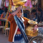 Water carrier in the market place, Bundi. | Photo taken by Jean M