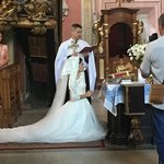 We happened to walk in on a wedding just when the mantilla was being placed on the  brides head | Photo taken by Barbara D