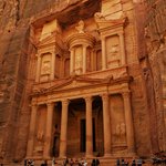 The Petra Archaeological Park is filled with breath-taking natural walkways between the high rocks and with awe-inspiring carvings and buildings, but the most famous and magnificent of the edifices is the Treasury. Estimated to have been built in the 1st century BC, the Treasury is about 128 feet (39 meters) high.   The purpose of the Treasury is unclear. Some archaeologists believed it to be a temple, while others thought it was a place to store documents. However, the most recent excavation here has unearthed a graveyard beneath the Treasury.  Whatever its original purpose, it is an amazing sight, particularly when the sun is beginning to rise or set, when it reflects the reddish glow of the sandstone.  - Petra, Jordan | Photo taken by Rich W