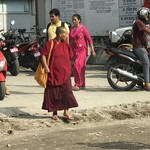 Monk in a town | Photo taken by Lisa D
