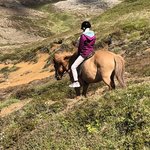 Mom riding away | Photo taken by Julie R