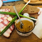 Salo, slices of fat, served with borscht | Photo taken by Barbara D